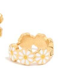 Showcasing kids gold plated surgical steel enamel daisy hoop earrings with white and yellow floral design in post detail view - link has visual effect only