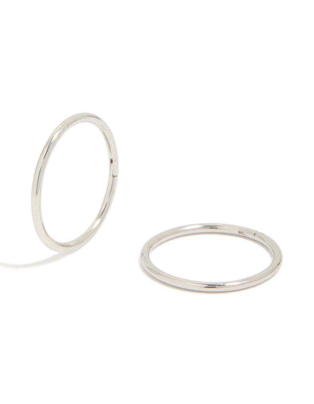 Beautifully crafted kids surgical steel sleeper earrings with dainty, hoop closure in silver front view