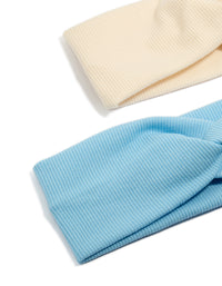 Crafted from ribbed twisted fabric, these stretch headbands 2-pack with solid print in sky blue and beige detail view - link has visual effect only