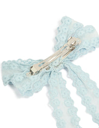 Featuring floral fabric bow hair clip in powder blue with metal clasp mechanism, side view - link has visual effect only