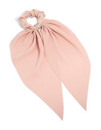 Showcasing a peach pink diamante long scarf scrunchie with solid print in light pink and silver front view - link has visual effect only