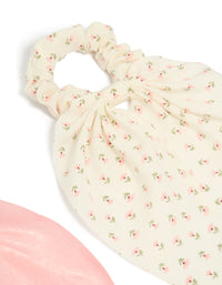 Designed with bow in floral pattern, these 2-pack printed flowers and pink fabric scarf scrunchies showcase light pink, ivory, and olive colors side view - link has visual effect only