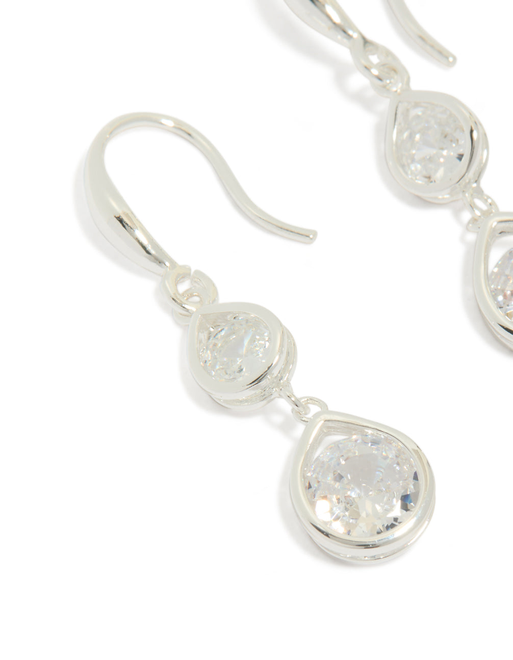 Highlighting silver plated double teardrop hook earrings with clear cubic zirconia close up view