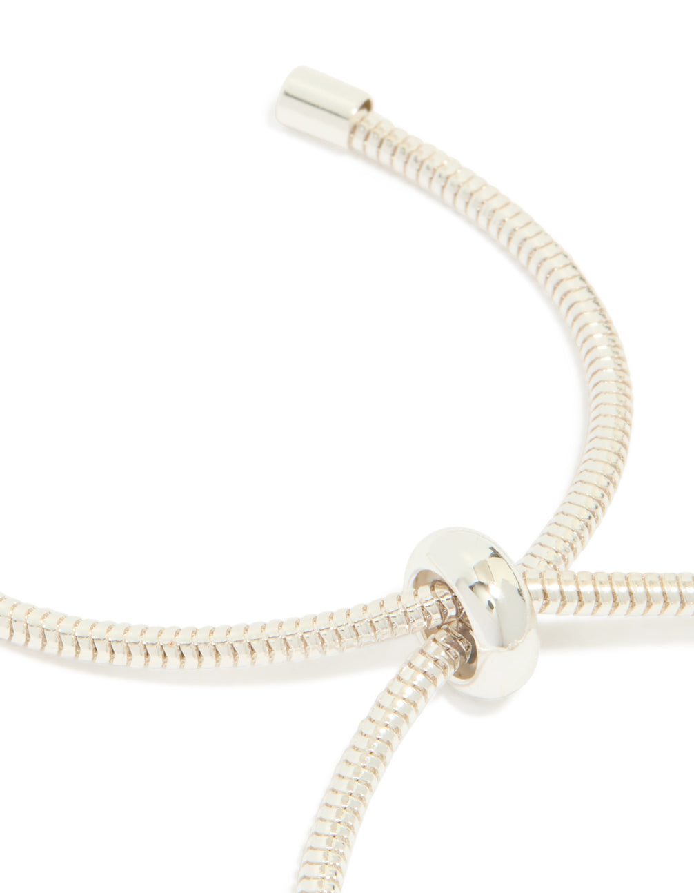 Silver plated diamante heart rondell charm bracelet with beads highlighting toggle closure detail view