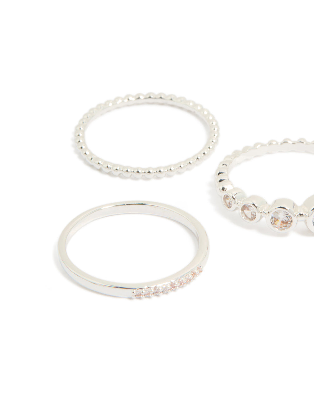 Featuring silver plated cubic zirconia bezel rings 5-pack in clear stone close up view