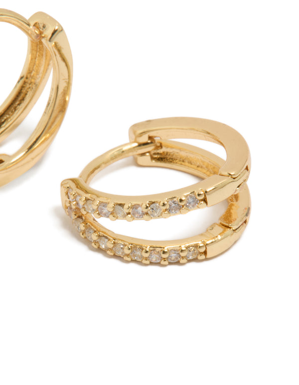 Highlighting small double layered huggie earrings with cubic zirconia design in silver post detail view