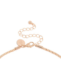 Featuring pearl details, this rose gold plated twist chain adjustable Y-necklace in statement design clasp detail view - link has visual effect only