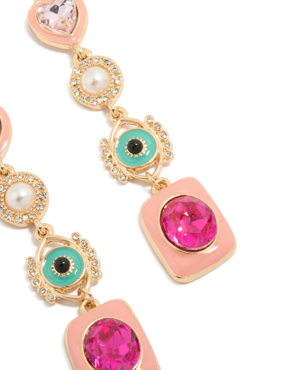 Highlighting gold enamel celestial drop earrings with statement charm, hamsa hand, pearl surrounded by crystals, and evil eye detail close up view