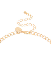 Featuring a gold mesh bib tassel necklace with statement design clasp detail view - link has visual effect only