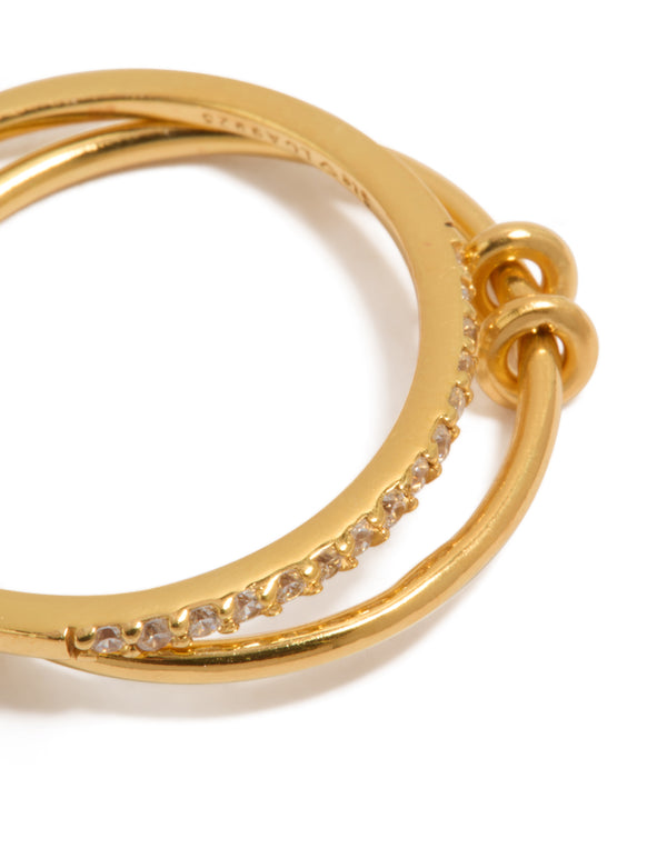 Elegantly designed gold plated sterling silver cubic zirconia double link ring with charm accents close up view