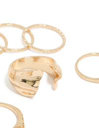 Featuring gold dainty organic rings in a 7-pack close up view - link has visual effect only