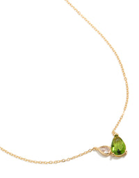 Showcasing a gold plated August green cubic zirconia pendant necklace featuring with crystal accents close up view - link has visual effect only