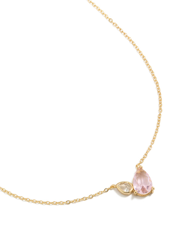 Discover this gold plated October pink cubic zirconia pendant necklace featuring crystal in dainty style close up view