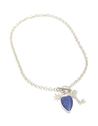 Explore this silver diamante and blue stone heart chunky style necklace with celestial charms featuring star pendant front view - link has visual effect only