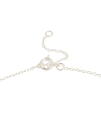 Showcasing a heart and key pendant necklace with charm details in sterling silver featuring toggle closure clasp detail view - link has visual effect only