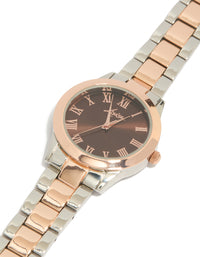 Elegant mixed metal watch with brown roman numeral dial, round shape, formal occasion, women's analog timepiece, link band in multi-color, gold and silver tones watch face detail view - link has visual effect only