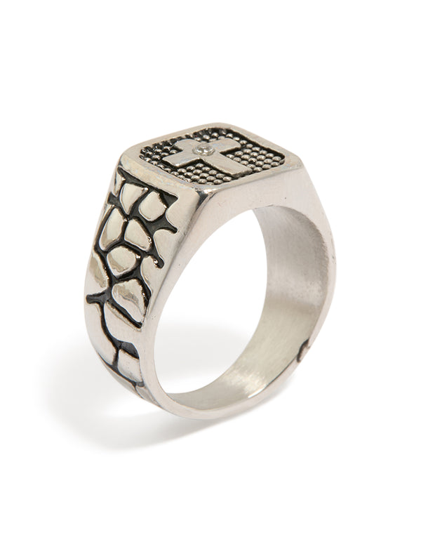 Crafted from waterproof stainless steel, this mens signet ring features a black etched cubic zirconia cross with statement design front view