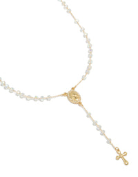 Showcasing a beaded rosary necklace with cross details, crafted from diamante in gold plated material close up view - link has visual effect only