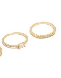 Highlighting gold plated cubic zirconia square bezel rings with statement stackable design close up view - link has visual effect only
