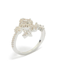 Highlighting a dainty silver plated cubic zirconia floral wrap ring with clear accents close up view - link has visual effect only