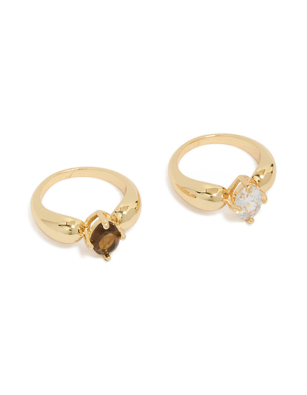 Showcasing gold plated cubic zirconia clear and brown puffy rings in a 2-pack with dainty styling front view