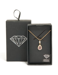 Beautifully crafted gold red pear cubic zirconia pendant necklace with statement design front view - link has visual effect only