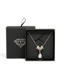 Showcasing a silver cubic zirconia pear rondelle necklace crystal stone cut in white close up view - link has visual effect only