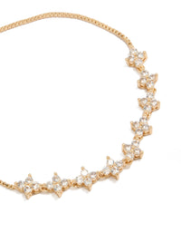 Featuring a floral cubic zirconia bracelet in gold with a statement style close up view - link has visual effect only