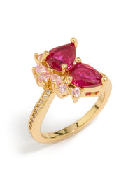 Featuring a gold plated statement ring with double pear cut red and light pink cubic zirconia front view - link has visual effect only