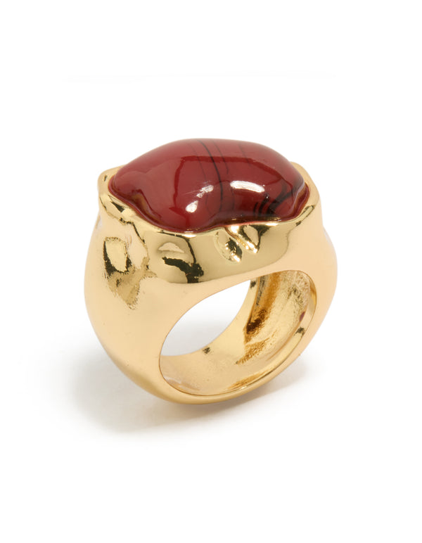 Highlighting a gold plated chunky molten burgundy stone ring in maroon side detail view