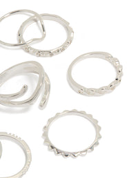 Featuring charm and disc accents, silver mixed swirl stacking rings 8-pack side detail view - link has visual effect only