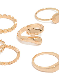 Showcasing thin wrap circle and rectangle signet rings 8-pack in gold with dainty style close up view - link has visual effect only