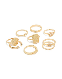 Showcasing dainty gold rings featuring numbers and disc details with clear diamante accents in a 9-pack front view - link has visual effect only