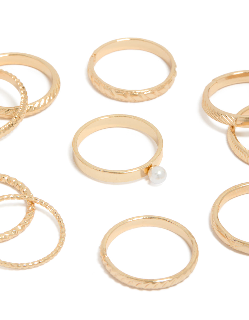 Showcasing gold textured and pearl rings 10-pack close up view