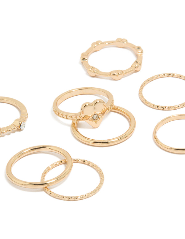 Featuring gold diamante heart band rings 8-pack close up view