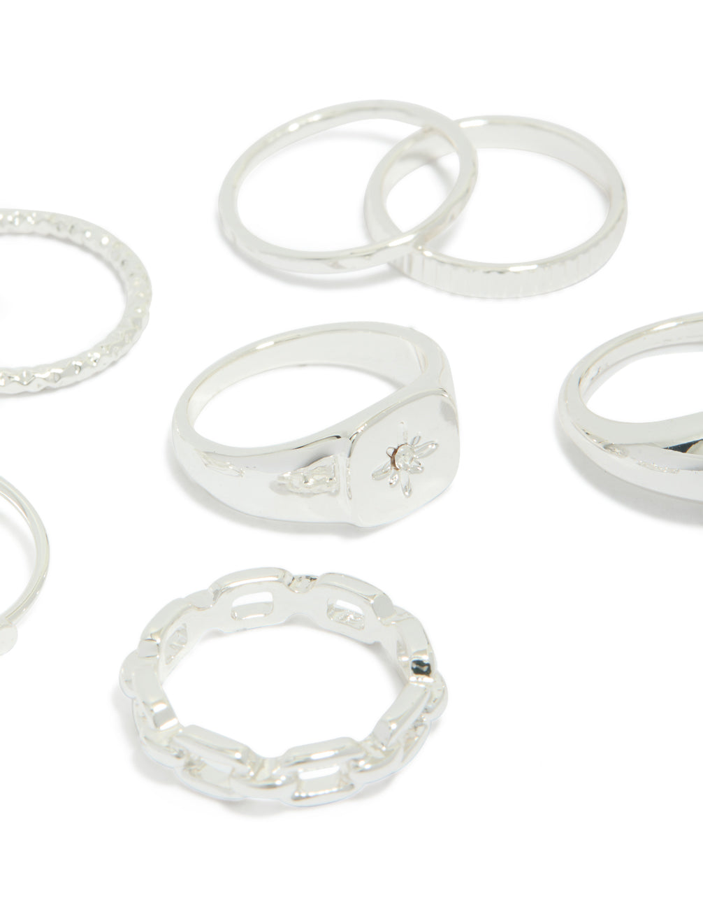 Crafted with celestial dainty design in silver featuring star accents close up view