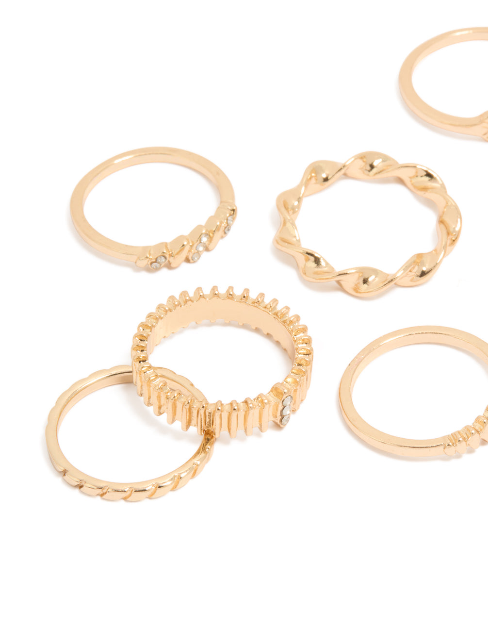 Statement gold signet and ribbed rings showcasing celestial star in a 10-pack close up view