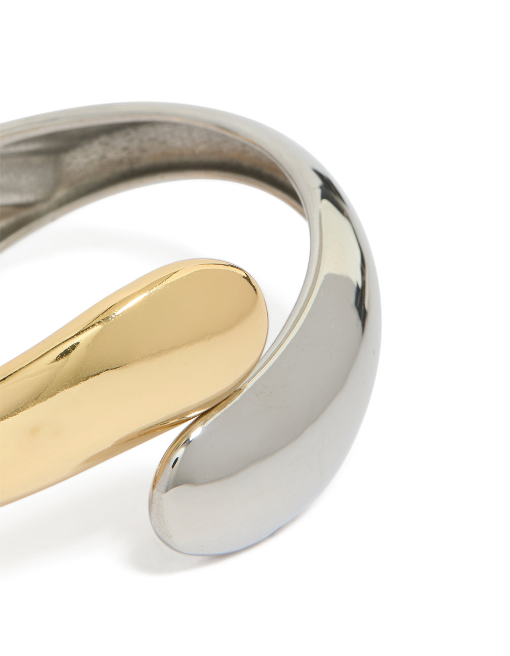 Crafted from waterproof mixed plated stainless steel round twisted cuff bangle in silver and gold with chunky styling close up view