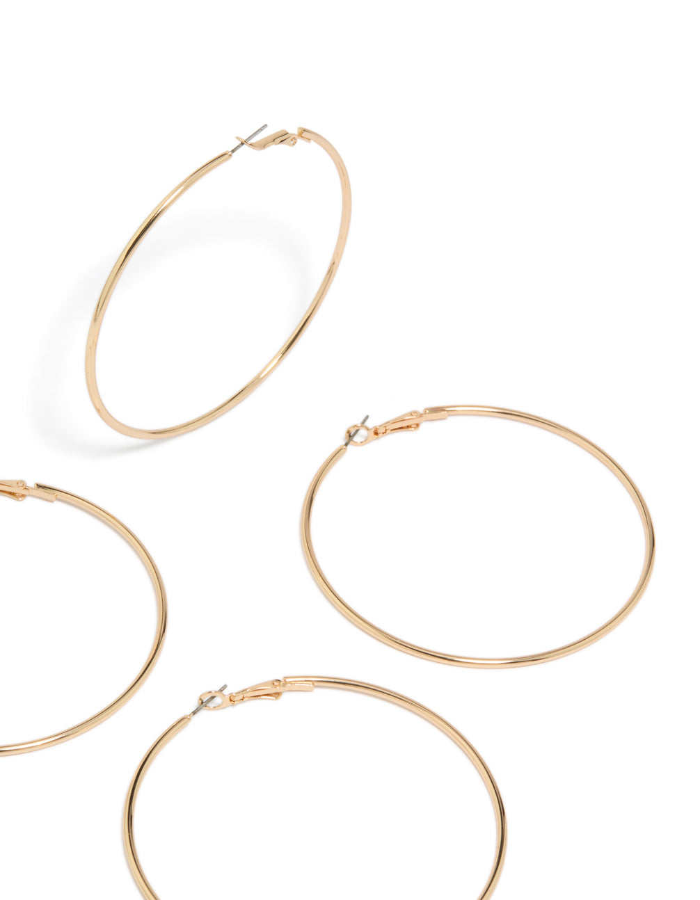 Showcasing gold large hoop earrings 2-pack with statement styling and clasp detail view