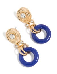 Showcasing statement earrings in gold with dark blue acrylic circle drop design front view - link has visual effect only