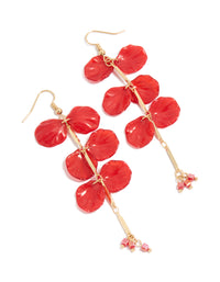 Showcasing red beaded petal drop earrings in gold and coral tones front view - link has visual effect only