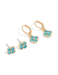 Featuring floral diamante stud and huggie earrings in a 2-pack set with turquoise stones and gold finish front view - link has visual effect only