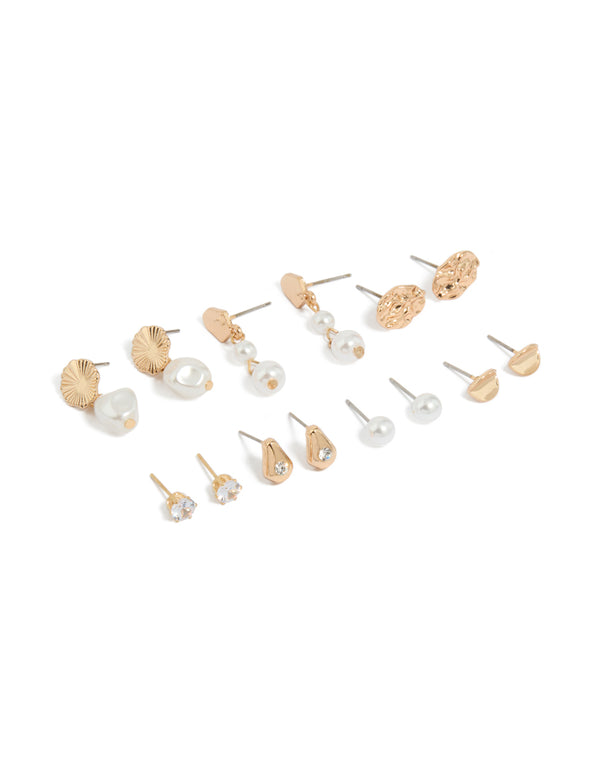 Featuring gold organic shape and pearl stud earrings in a 7-pack front view