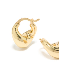 Showcasing statement wavy hoop earrings in gold plated material with beautiful color close up view - link has visual effect only