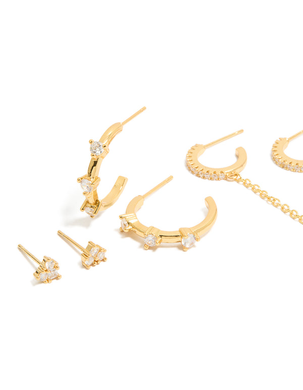 Featuring statement cubic zirconia crystal gold plated studs and hoop earrings 4-pack close up view