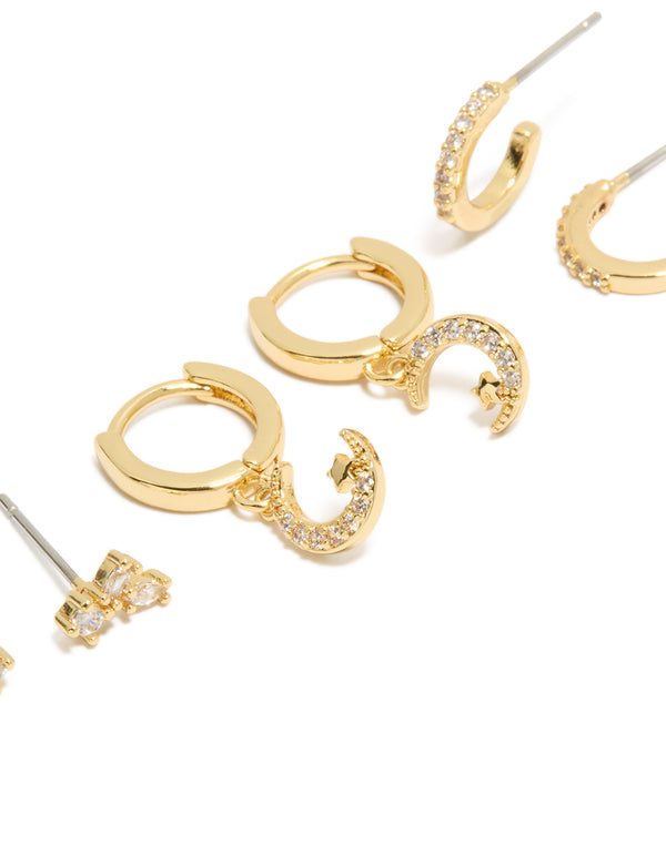Highlighting celestial hoop and huggie closure earrings with cubic zirconia moon details, in gold plated finish, 3-pack close up view