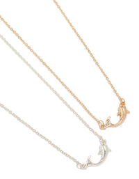 Showcasing mixed metal diamante dolphin necklaces in a 2-pack featuring ocean details with gold and silver tones close up view - link has visual effect only