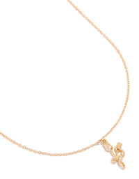 Delicate cubic zirconia rose charm necklace featuring floral leaf design in dainty gold close up view - link has visual effect only
