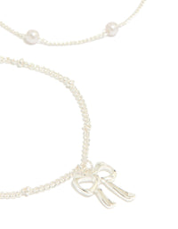 Silver Pearl & Bow Charm  Bracelets 3-Pack - link has visual effect only