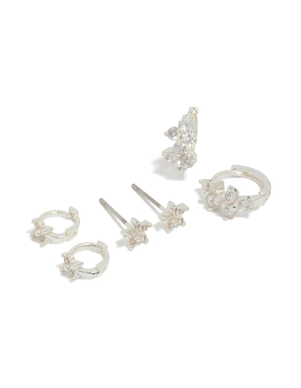 Showcasing floral Cubic Zirconia Stud and Huggie earrings in a 3-pack front view